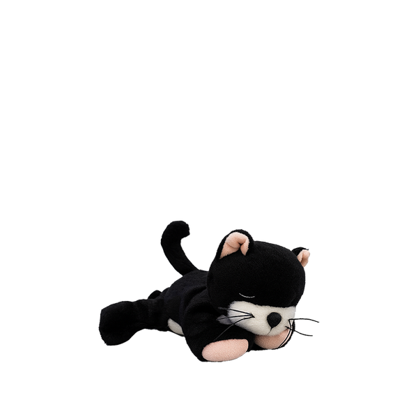 Black and white plush toy cat on a white background