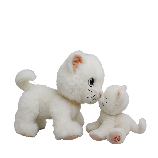 Two white plush cats on a white background