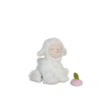 White plush lamb toy with a pink nose on a white background