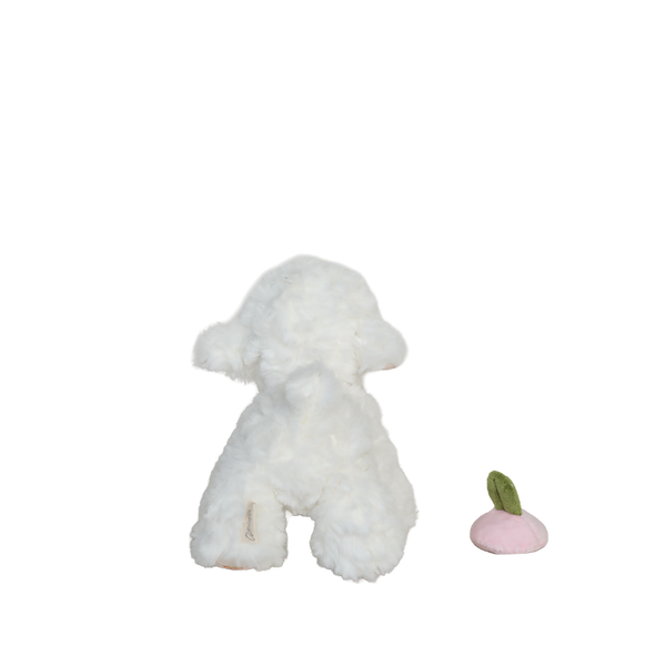 White plush dog toy with a pink and green object on a white background