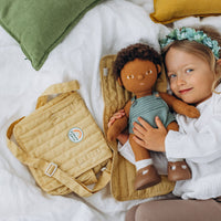 Olli Ella Yellow Doll changing mat and bag for kids imaginative play. Inclusive dolls to spark play and inspire magic.