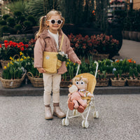 Olli Ella Yellow Doll changing mat and bag for kids imaginative play.