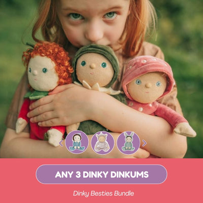 Child holding three dolls with a promotional banner for 'Any 3 Dinky Dinkums' bundle.