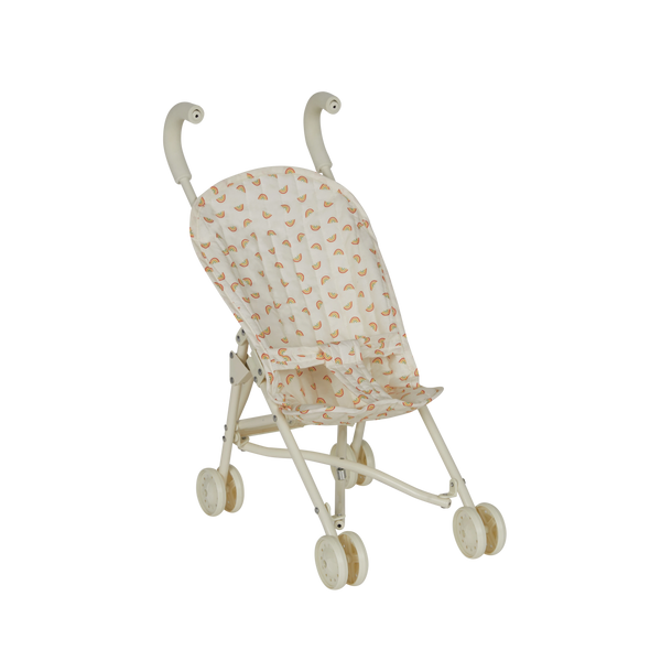 Miniature stroller with rainbow patterns on a white background