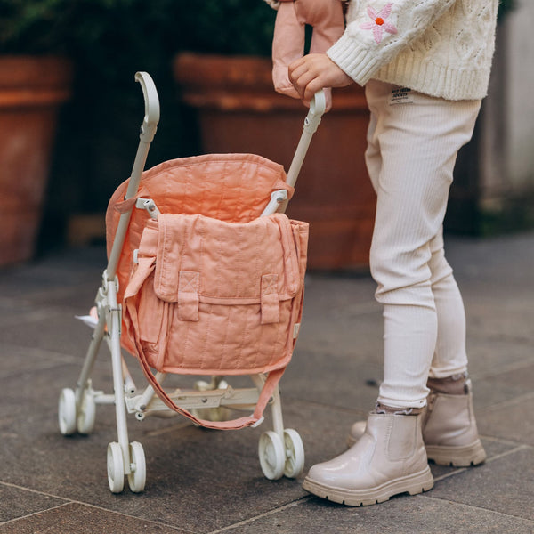 Olli Ella pink Doll changing mat and bag for kids imaginative play. Matches with our pink doll pram for kids.