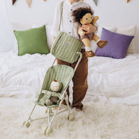 Olli Ella green Doll changing mat and bag for kids imaginative play.