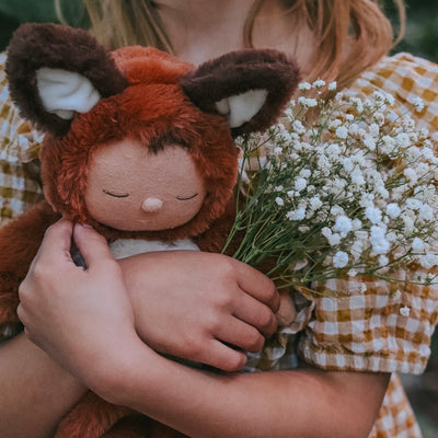 Meet Finnley Fox, our rust-coloured fox plush toy ideal for cozy snuggles and dreamy adventures. This posable plush fox has a soft outer, sweet embroidered face, and wears a non-removable suit making him the perfect toy from birth.