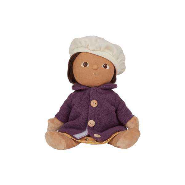 Stuffed toy with a purple outfit and white hat on a white background
