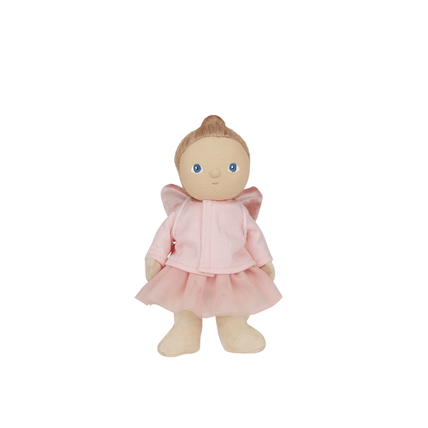 Stuffed doll with a pink outfit on a white background