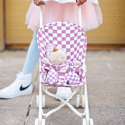 Purple check printed stroller for dolls, perfect for kids doll play.